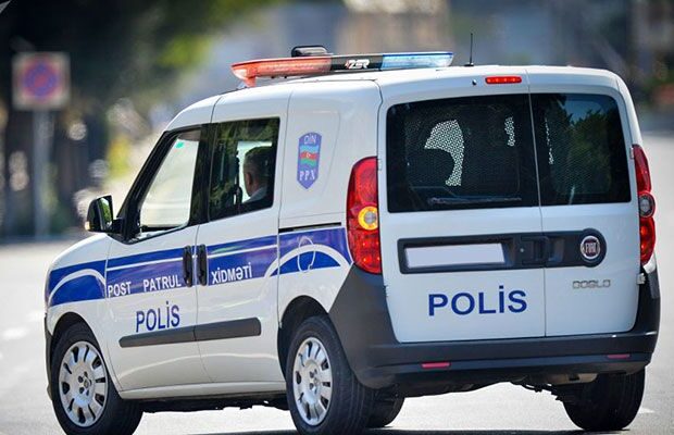 Polis maşınının şüşəsini sındıran qadın cəzalandırıldı